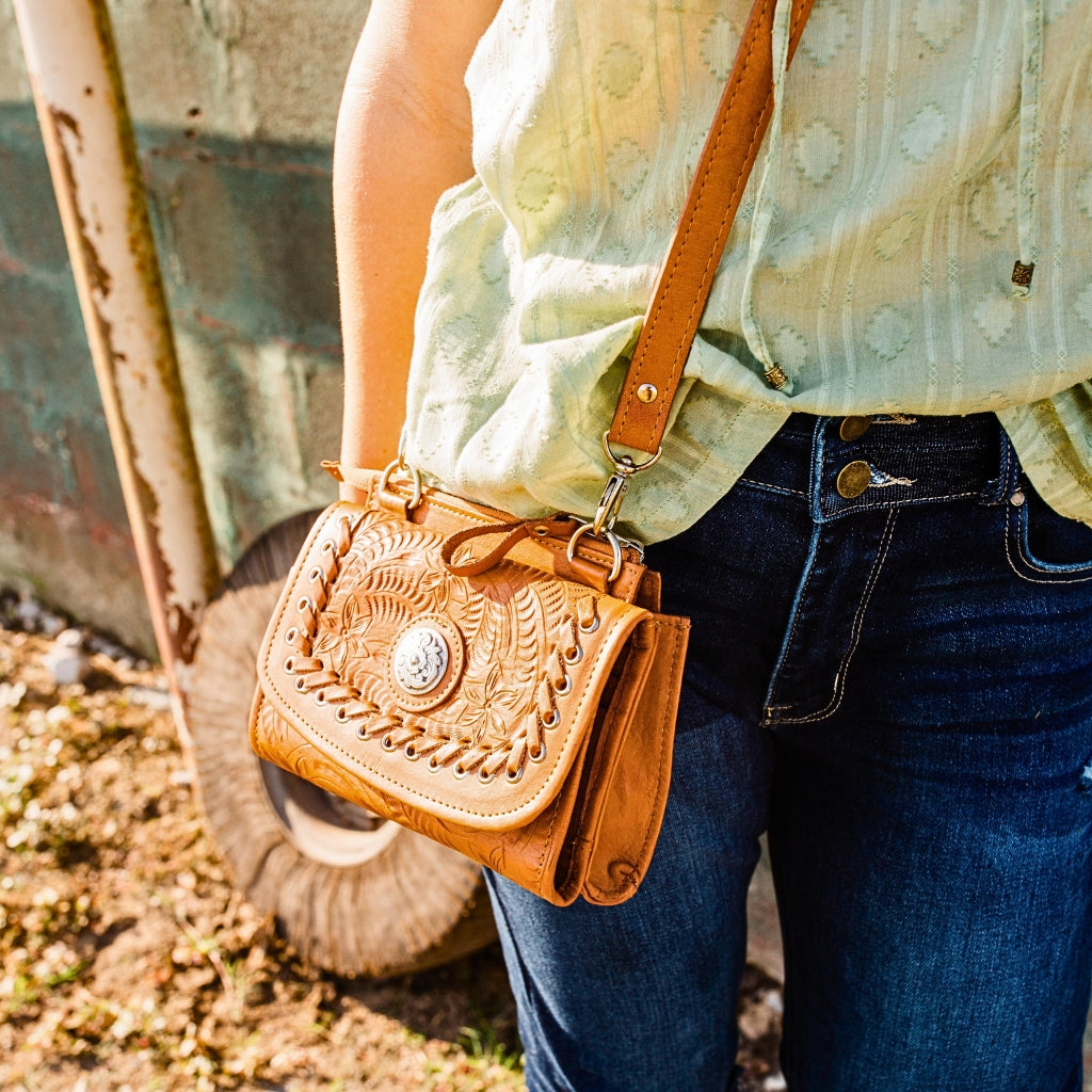 American West Texas Two-Step crossbody wallet featuring floral tooled leather, western concho detail, and handcrafted leather styling