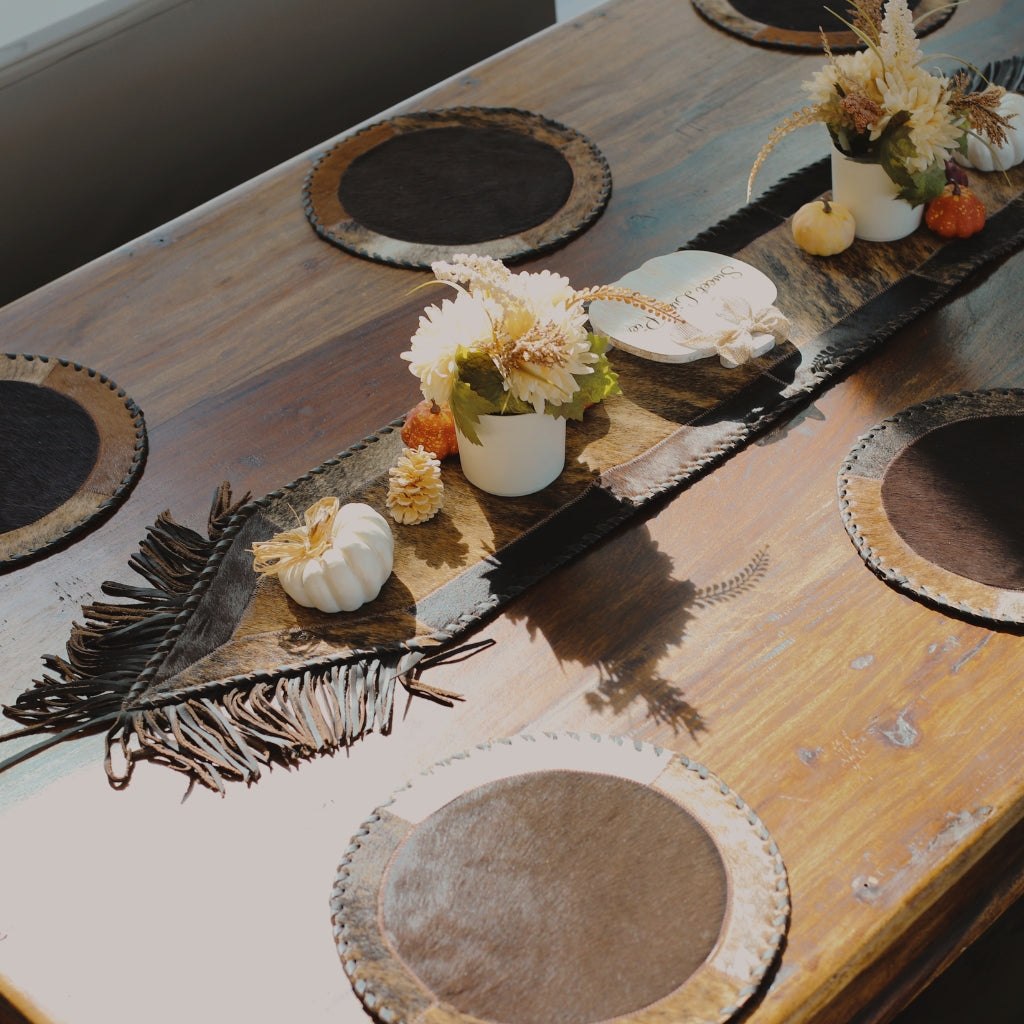 American West leather home decor and western table accents featuring handcrafted leather table runner, rustic placemats, and western dining decor