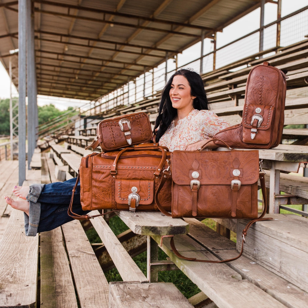 American West Handcrafted Leather travel bags and accessories featuring handcrafted western leather duffle bags, boot carrier bags, backpack, and travel organizers