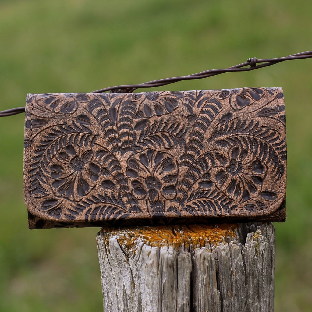 American West Handcrafted Leather wallets collection featuring floral tooled leather women’s wallet and handcrafted men’s western leather wallet
