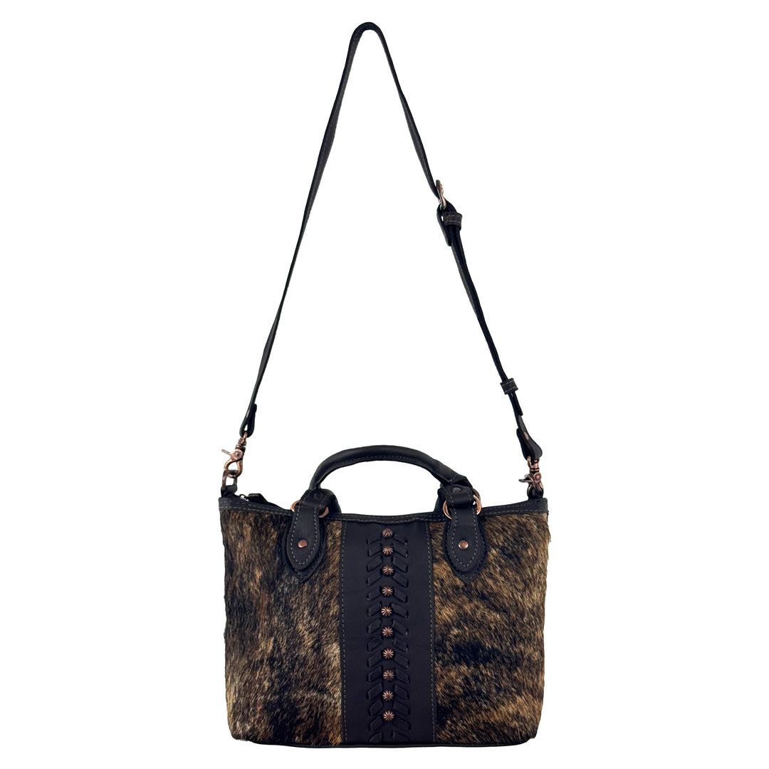 Cow Town conceal carry convertible satchel in brindle with hair-on hide leather accents with strap attached