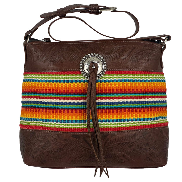 Maká Festive shoulder bag in brown with hand tooled leather, red themed hand woven tapestry, and bolo concho with tassle