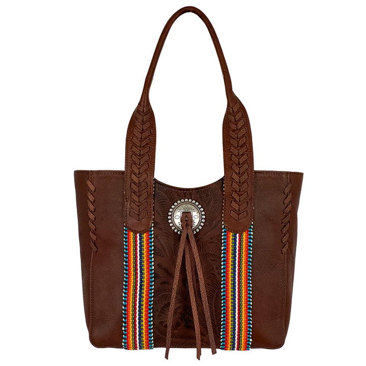 Maká Festive tote in brown with hand tooled leather, red themed hand woven tapestry, and bolo concho with tassle