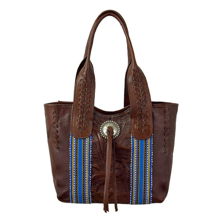 Maká Festive tote in brown with hand tooled leather, blue themed hand woven tapestry, and bolo concho with tassle