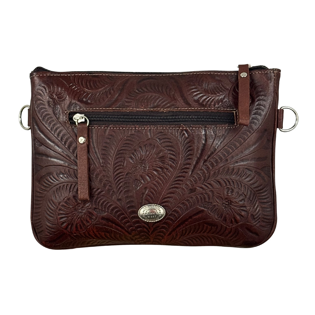 Back view Lariats and Lace multi-compartment Crossbody in brown with hand tooled leather, concho and tassel accents