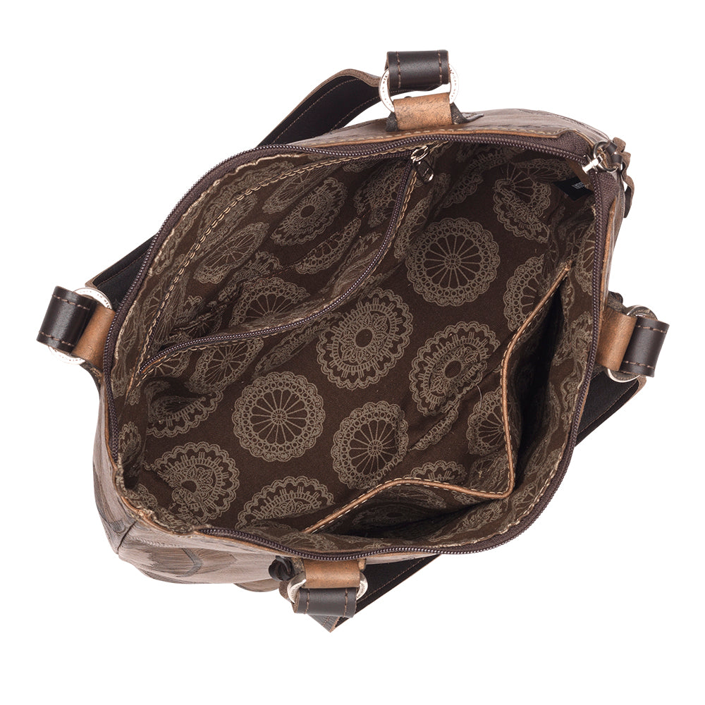 Inside view of Stars and Stripes bucket tote in navy with hand tooled leather accents