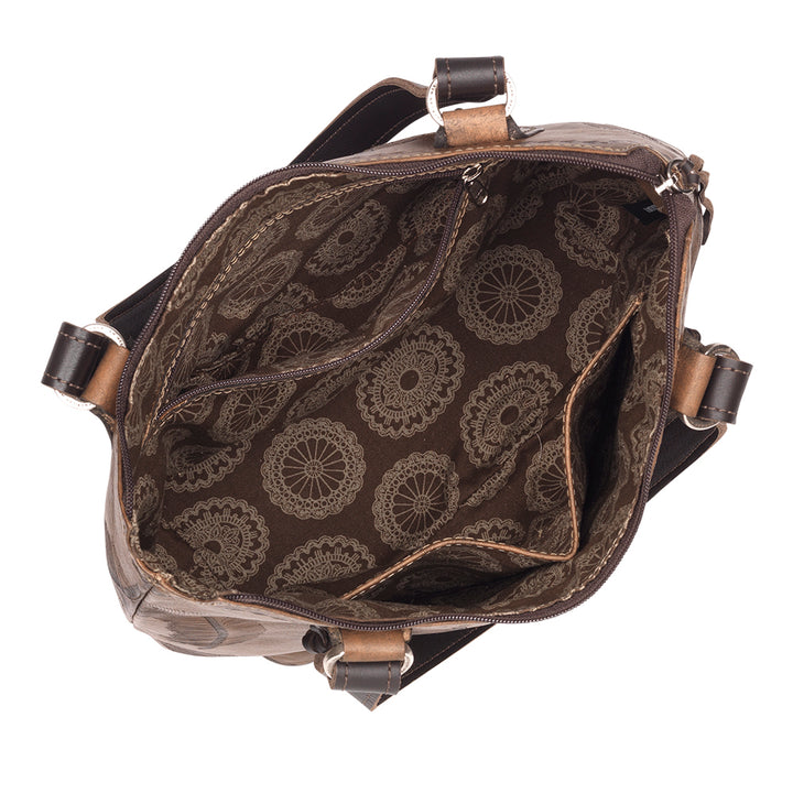 Inside view of Stars and Stripes bucket tote in navy with hand tooled leather accents