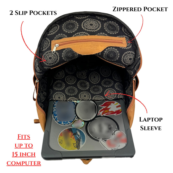 Inside view of Classic Travel backpack in natural tan shown with computer