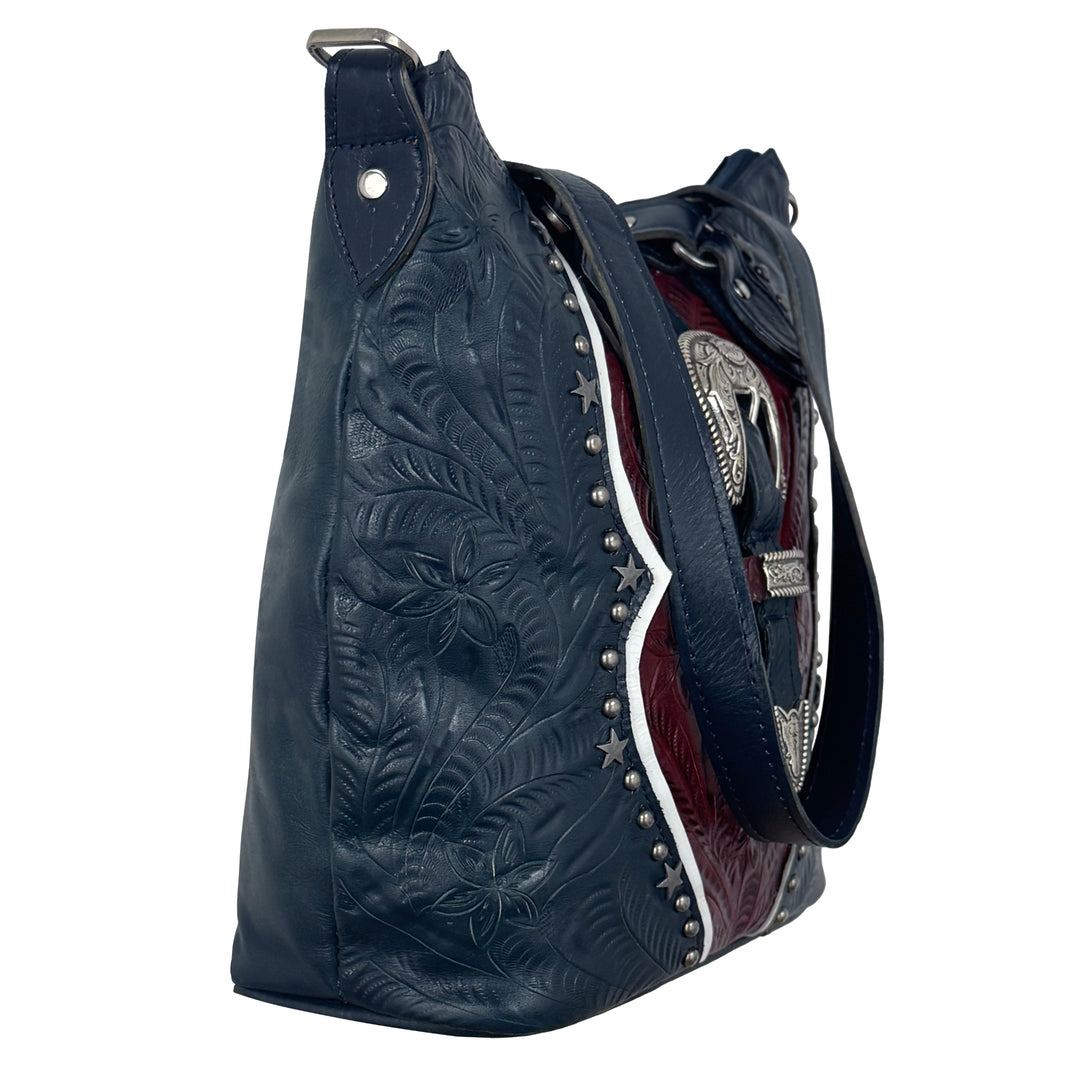 Side view of Stars and Stripes bucket tote in navy with hand tooled leather accents