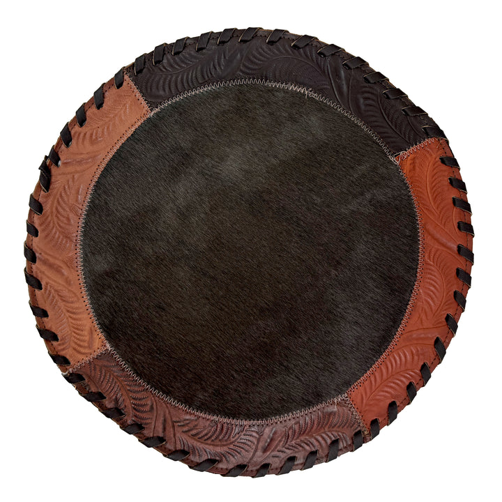 American West at Home placemat with brown hair-on hide center and hand tooled leather trim