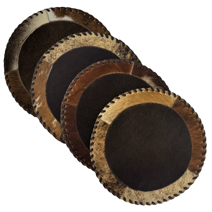 American West at Home placemat with brown hair-on hide center and hand tooled leather trim shown in four pack