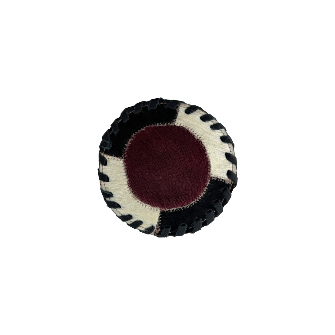 American West at Home coaster with crimson hair-on hide center and hand tooled leather trim