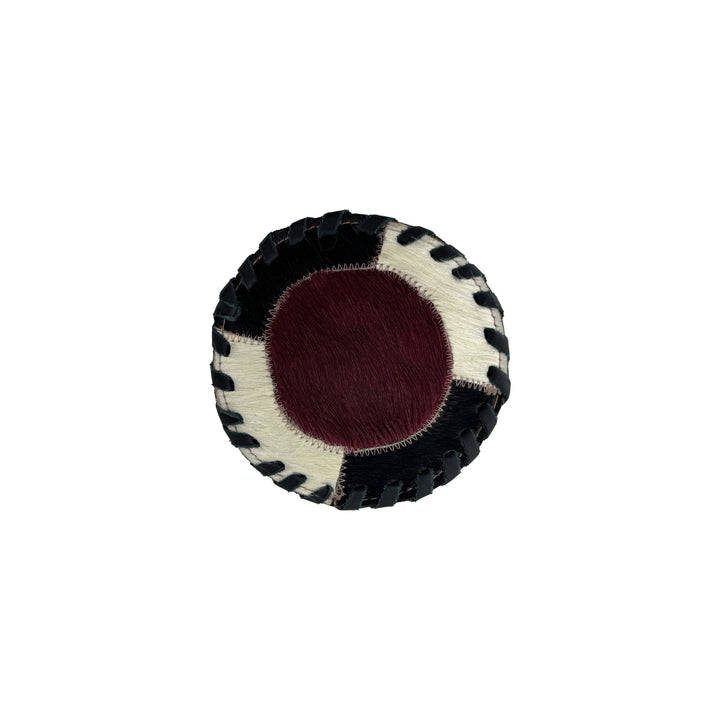 American West at Home coaster with crimson hair-on hide center and hand tooled leather trim