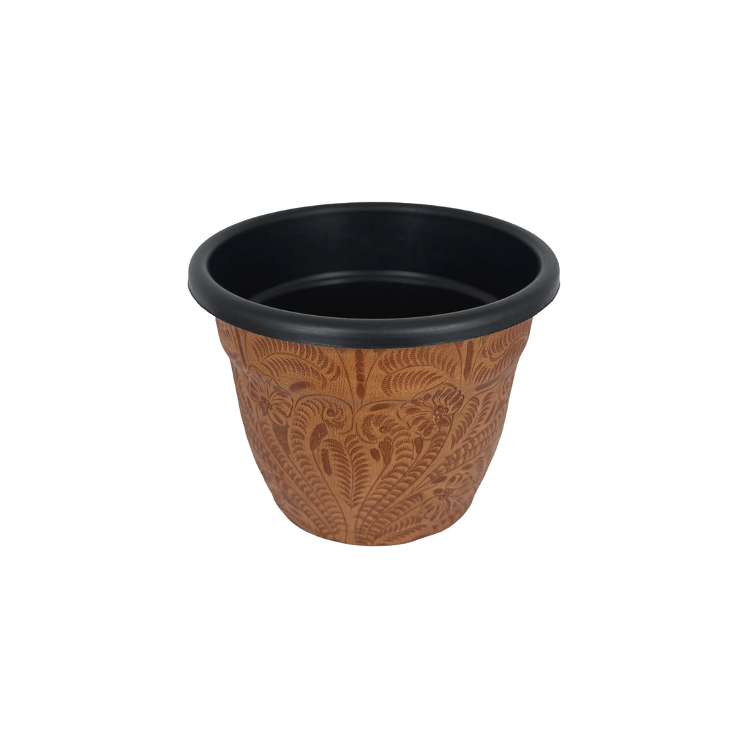 Side view of American West at Home five and a half inch round planter in natural tan with hand tooled leather accents