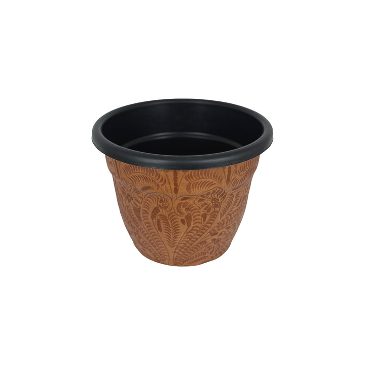 Side view of American West at Home five and a half inch round planter in natural tan with hand tooled leather accents