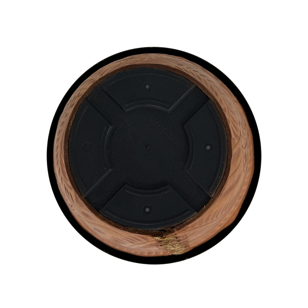 Bottom view of American West at Home six and a half inch round planter in natural tan