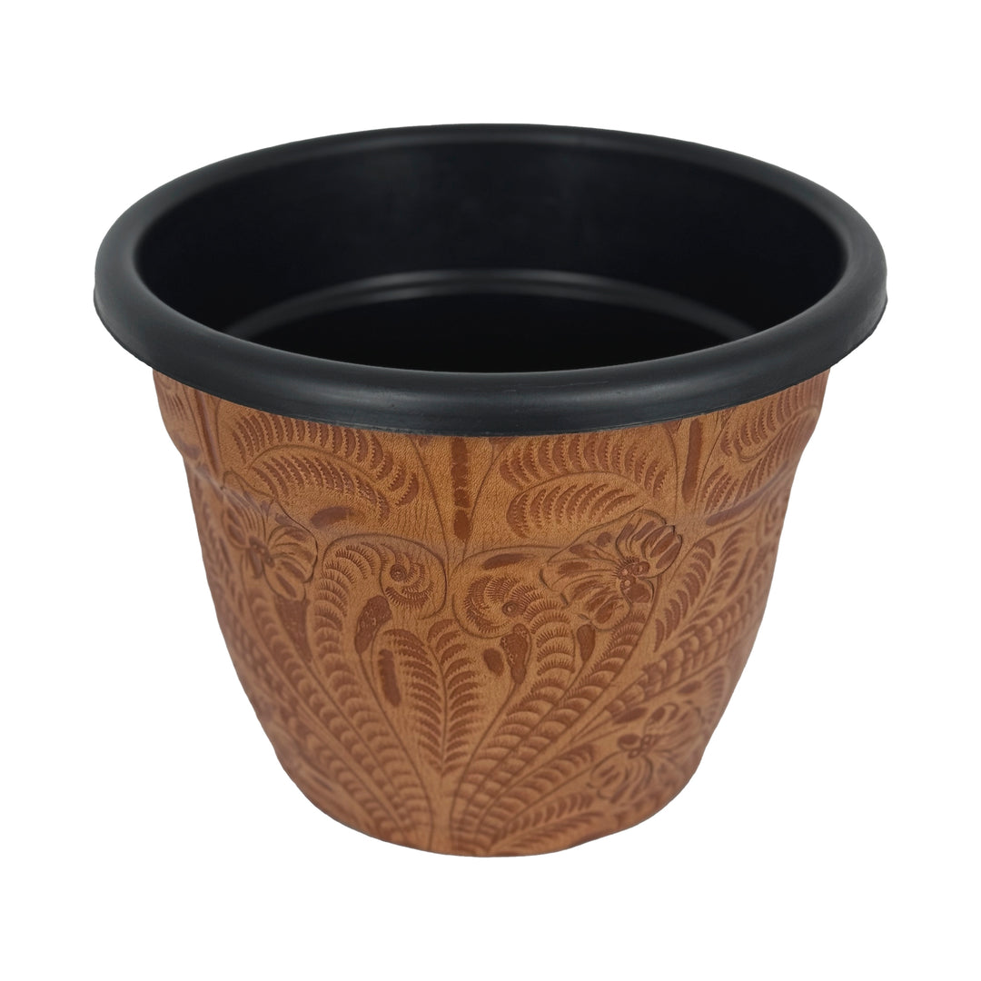 Side view of American West at Home ten inch round planter in natural tan with hand tooled leather accents