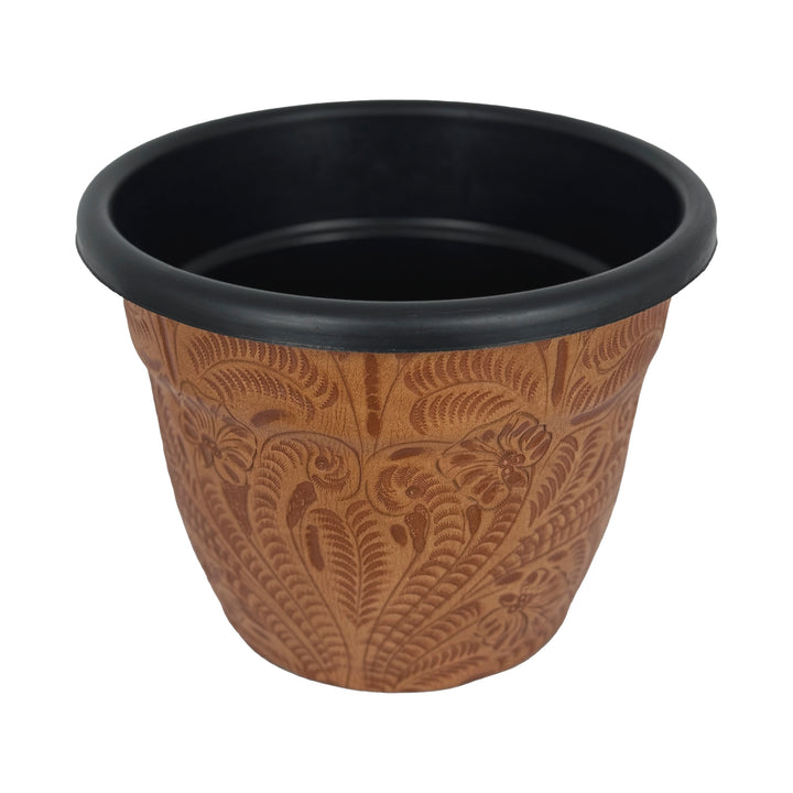 Side view of American West at Home ten inch round planter in natural tan with hand tooled leather accents