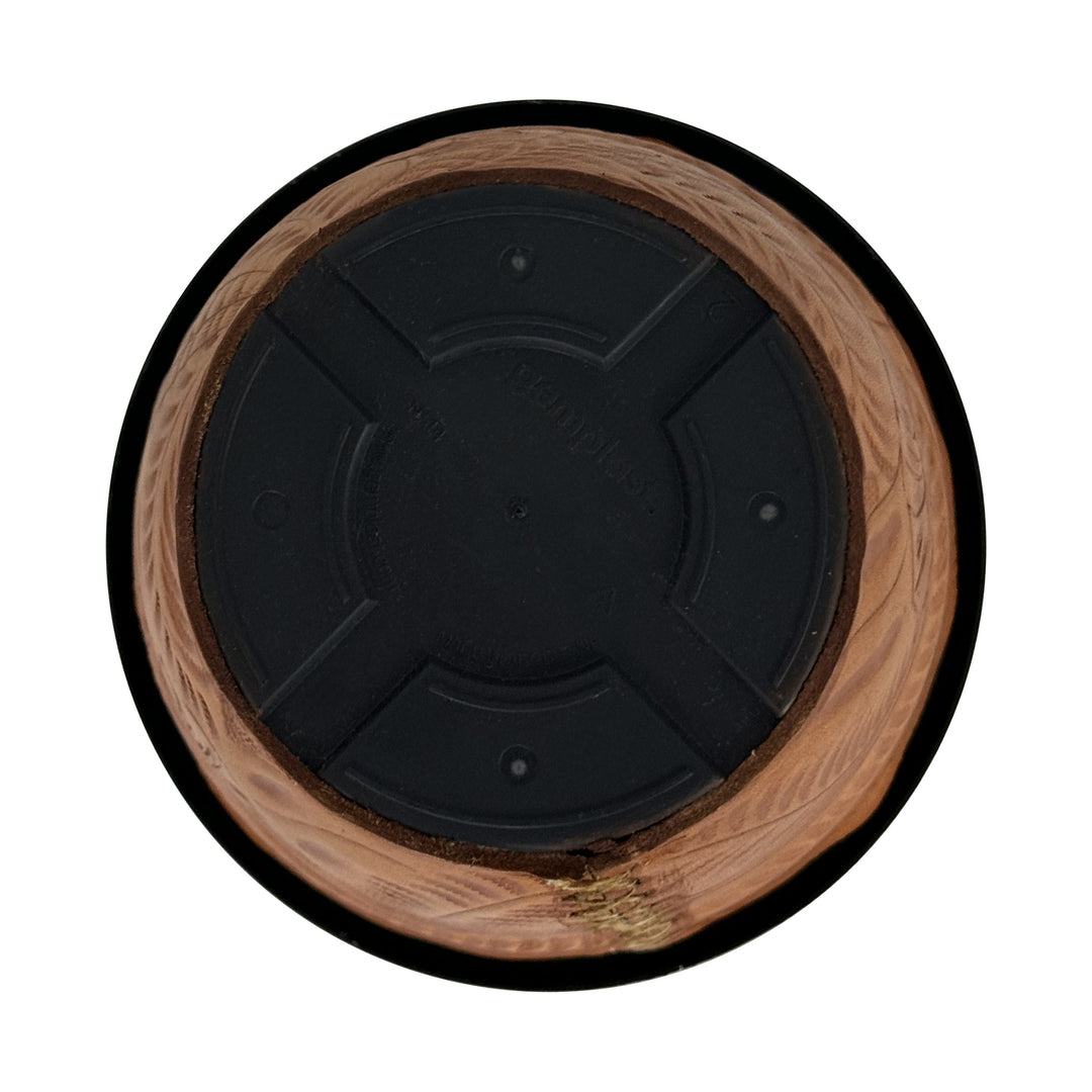 Bottom view of American West at Home ten inch round planter in natural tan with hand tooled leather accents