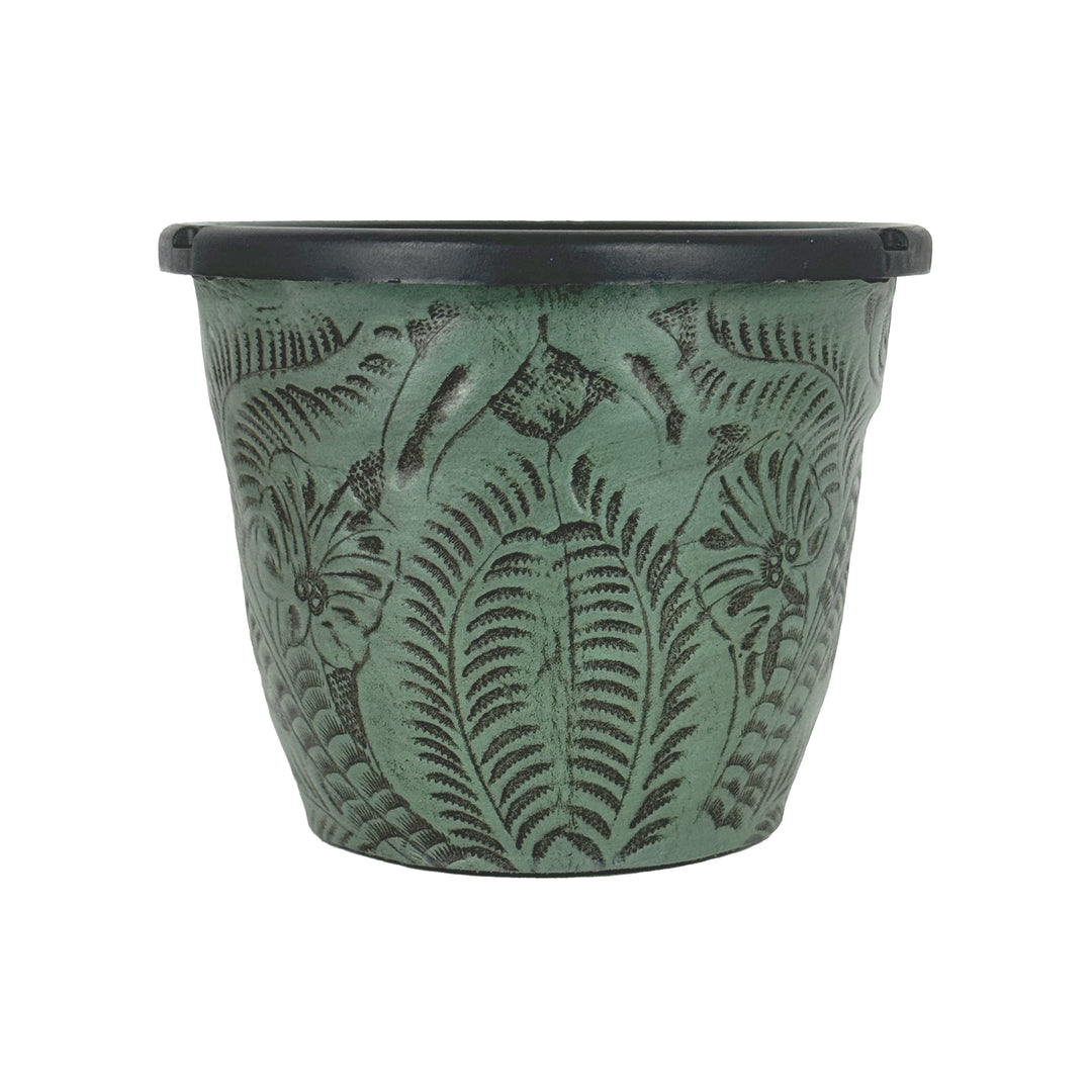 American West at Home six and a half inch round planter in light turquoise with hand tooled leather accents