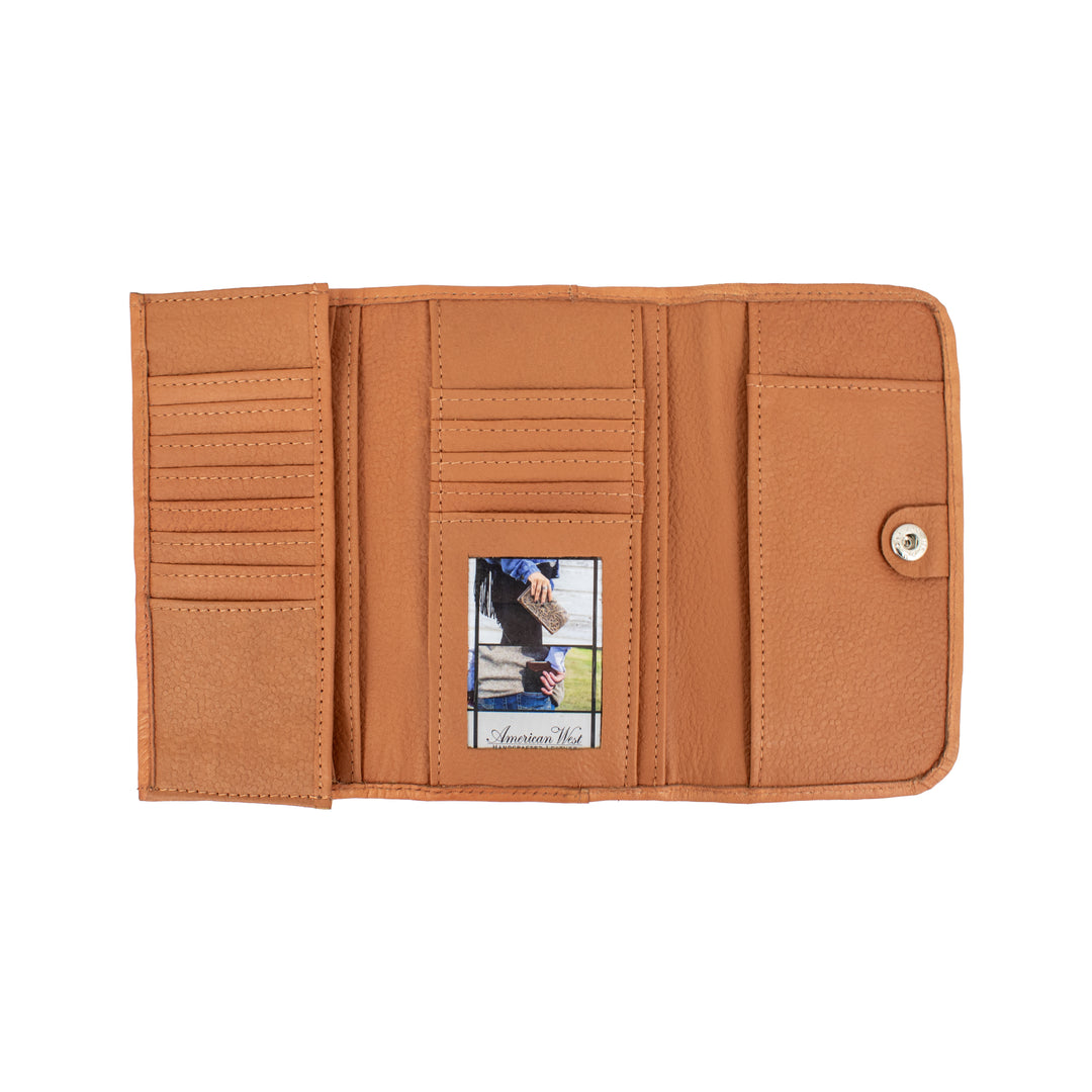 Inside view of Friendship Arrows tri-fold wallet in natural tan with card slots and clear id holder