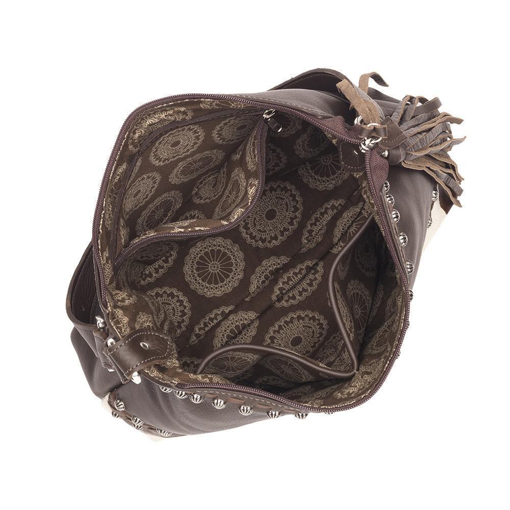 Inside view of Wild Horses shoulder bag with one zippered and two slip pockets