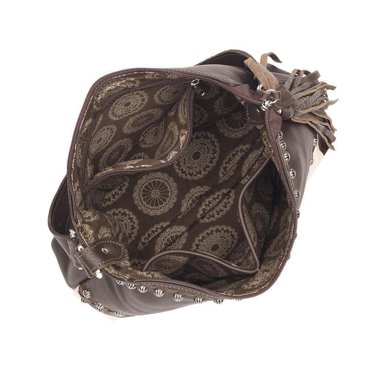 Inside view of Wild Horses shoulder bag with one zippered and two slip pockets