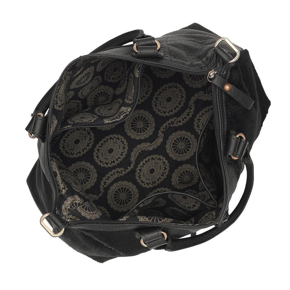 Inside view of Cow Town conceal carry convertible satchel in black