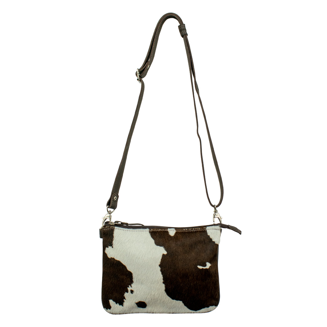 Cowtown multi-compartment Crossbody in pony with hair-on hide leather accents with strap attached