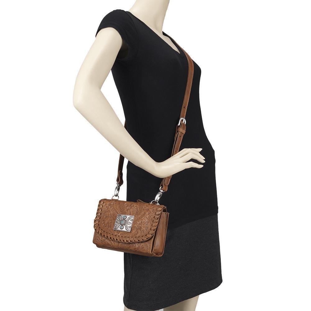 Mohave Canyon crossbody bag in natural tan accents on mannequin