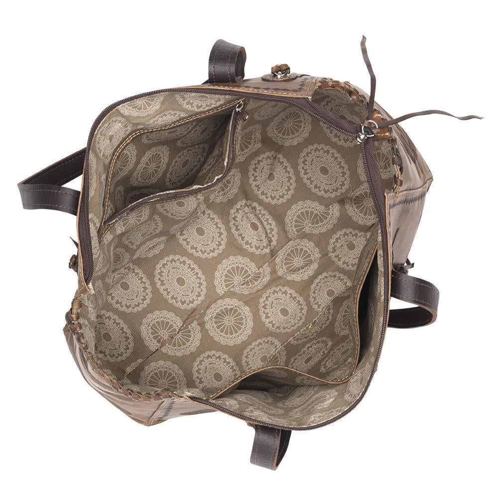 Inside view of Sacred Bird conceal carry tote with one zippered and two slip pockets