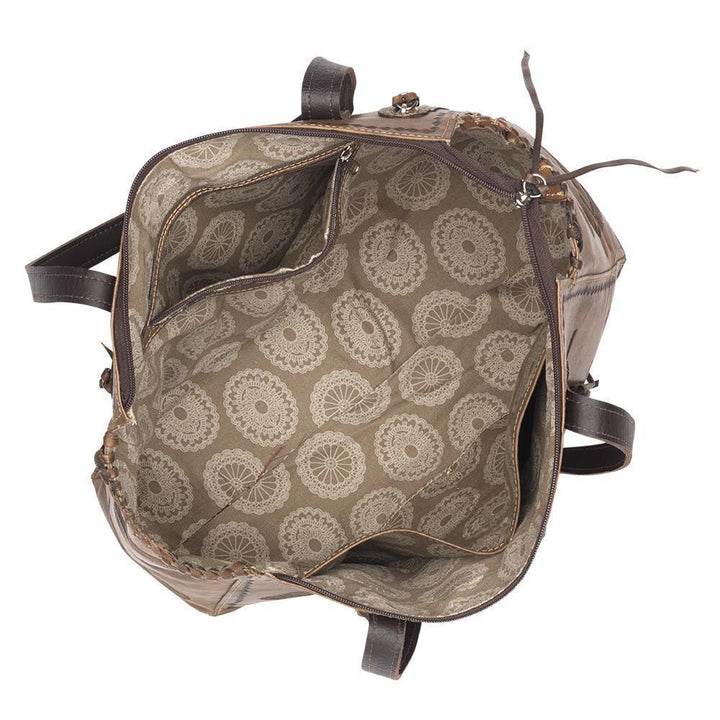 Inside view of Sacred Bird conceal carry tote with one zippered and two slip pockets