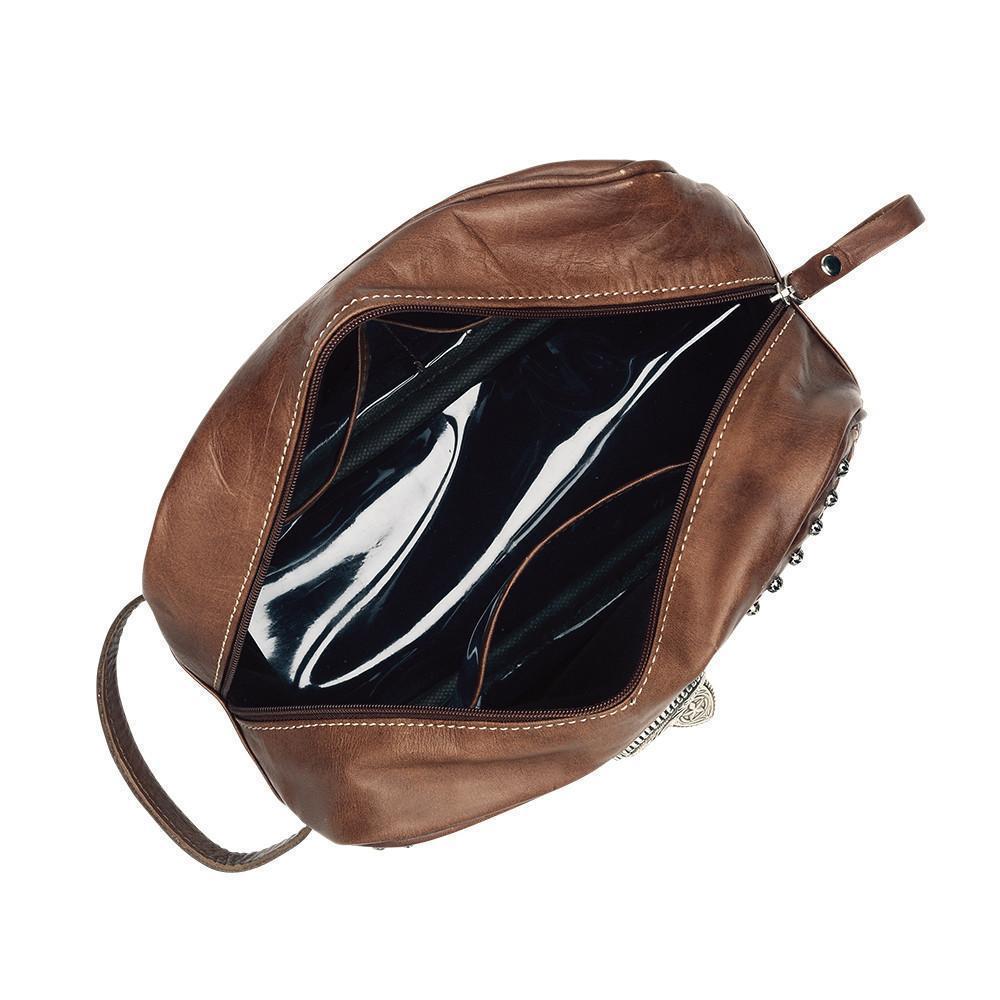 Classic Travel dopp/shaving kit in distressed charcoal brown with hand tooled leather and buckle set accents