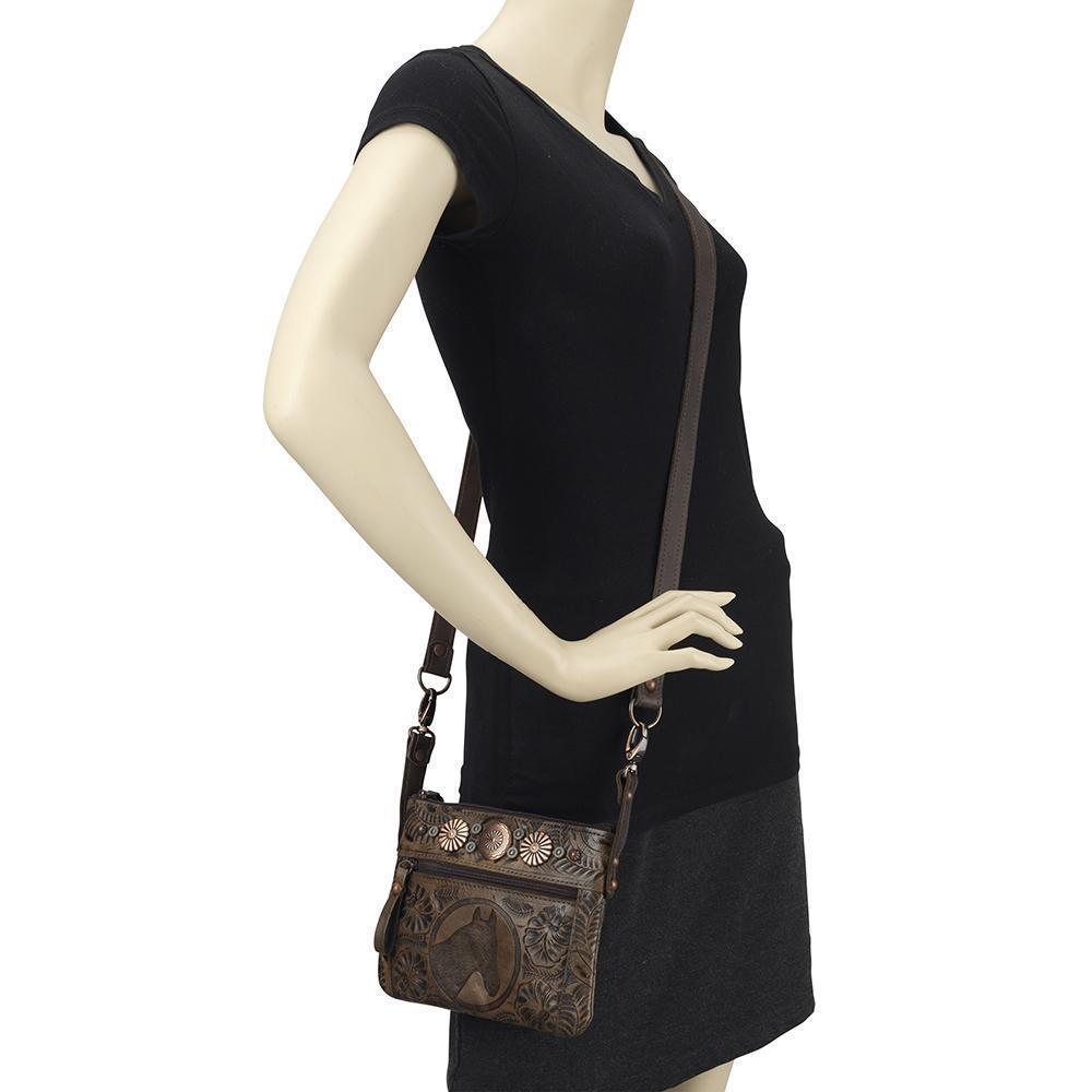 Prairie Horse crossbody/hip bag in distressed charcoal brown with hand tooled leather pattern and horse head on mannequin