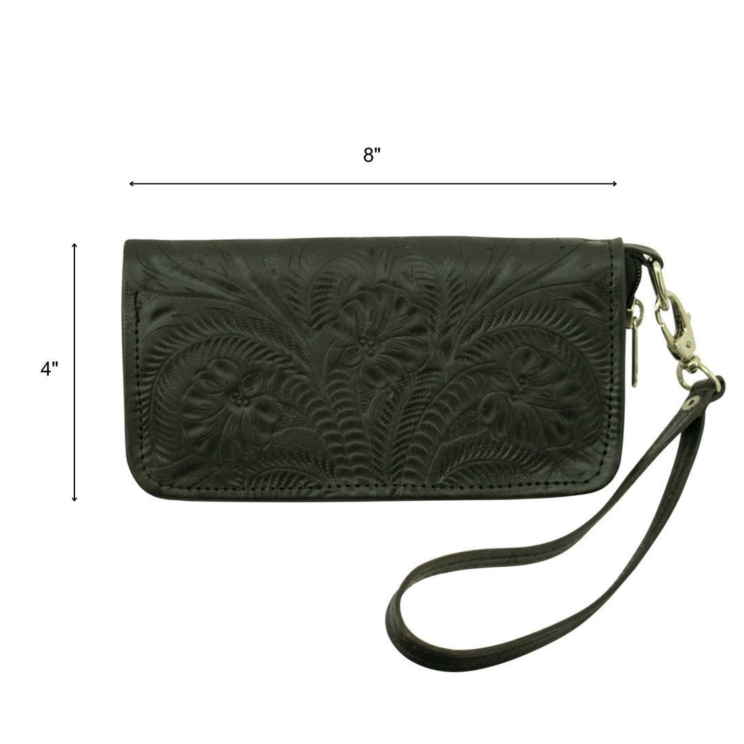 Lifestyle with model of Ladies zip-around wallet in chocolate brown with hand tooled leather accents