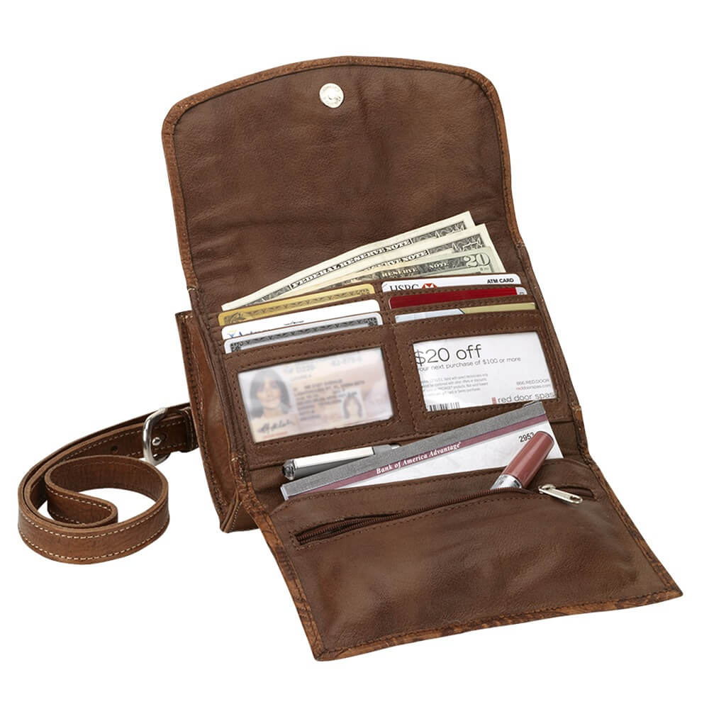 Inside view of Tribal Weave crossbody bag with multiple card and slip pockets and clear id holder